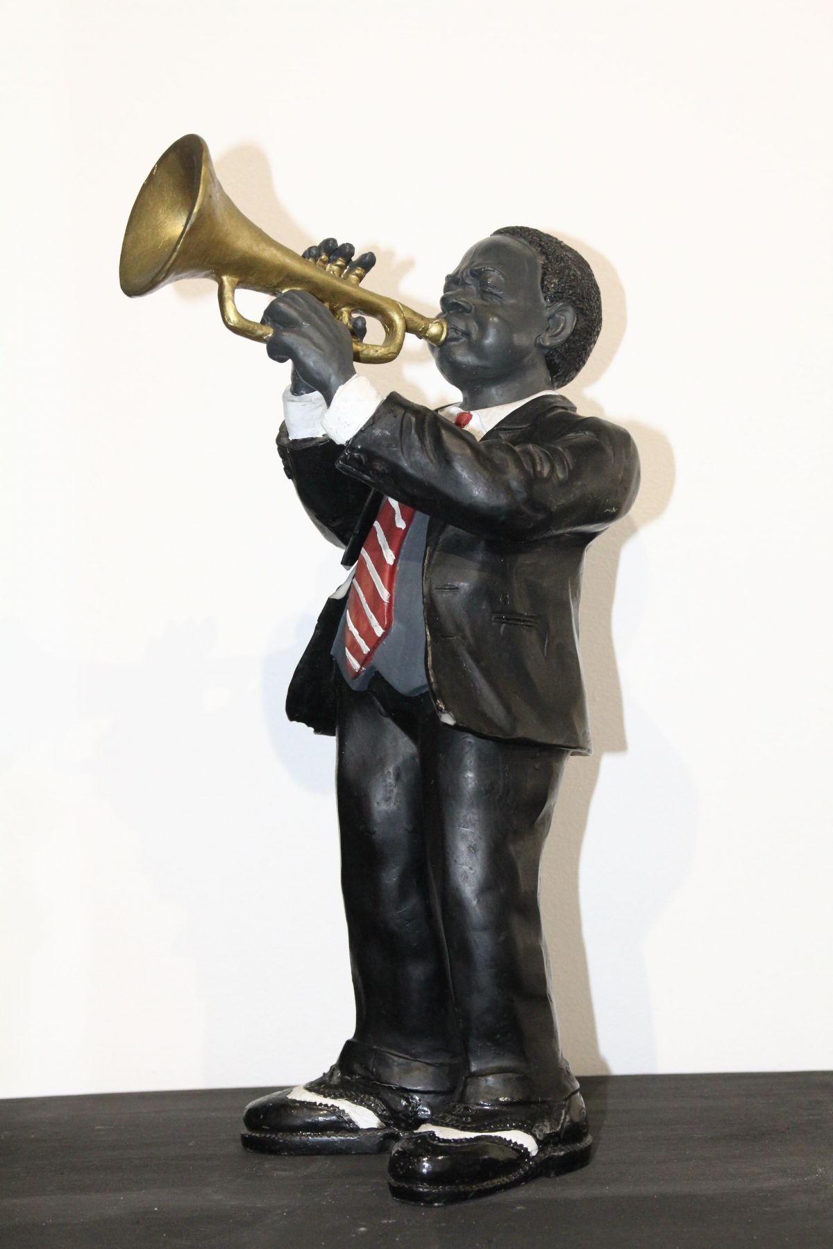 Statue en porcelaine Musicien époque XXème siècle 